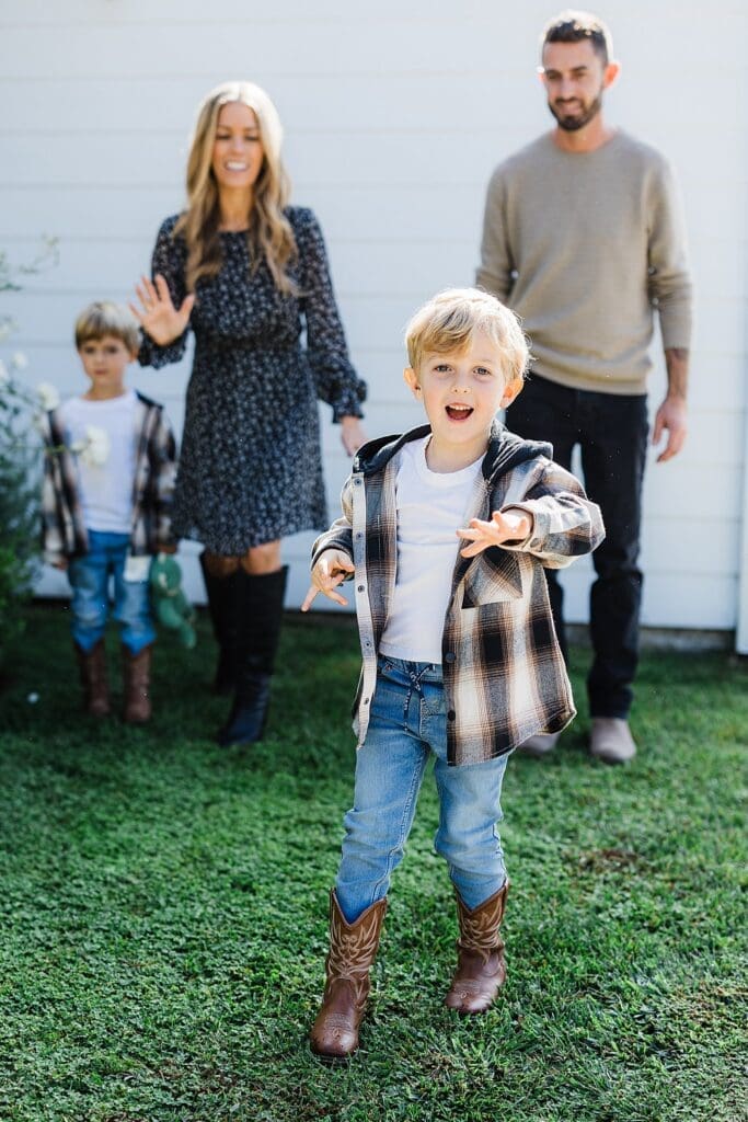 Stress-free family photography CA - candid family photo with kids playing and parents joining in."
